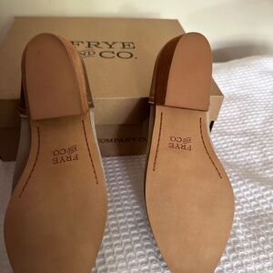 Frye and Co ankle booties.  Gold and bone color in new condition. 7.5M size